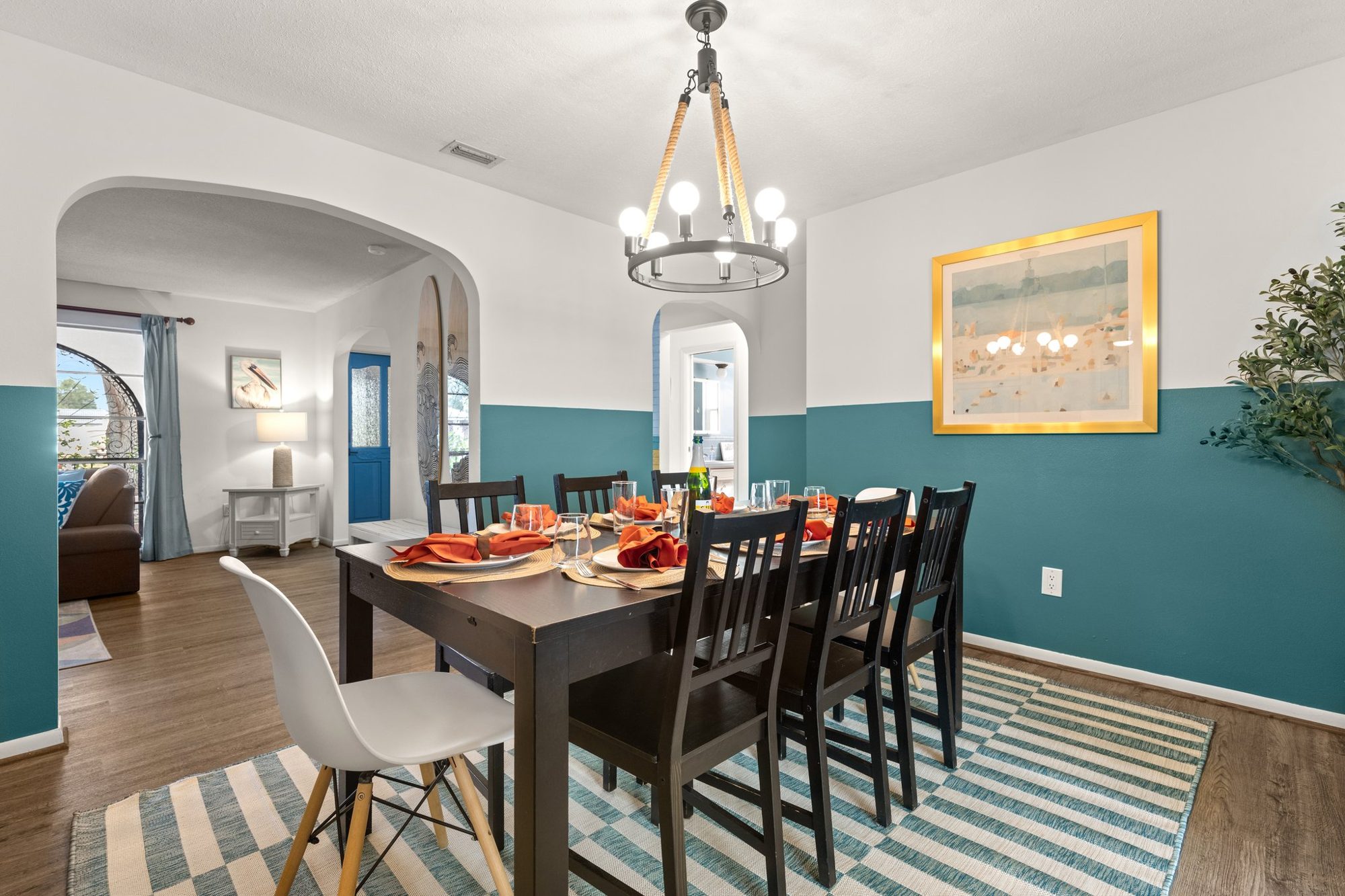 Coastal-styled dining area staged and equipped by Seize the Stay