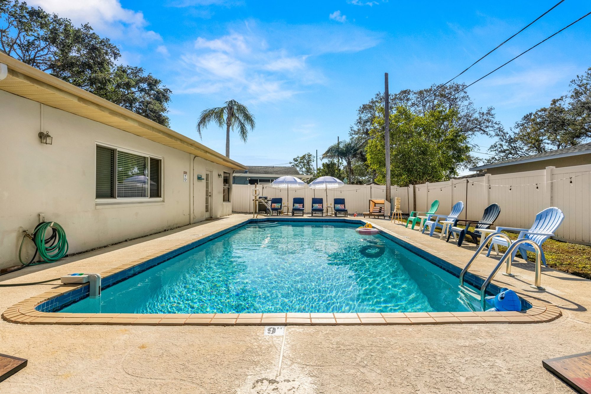 Private backyard pool at a Seize the Stay managed vacation rental in Largo, Florida